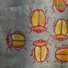 Yellow beetle apron